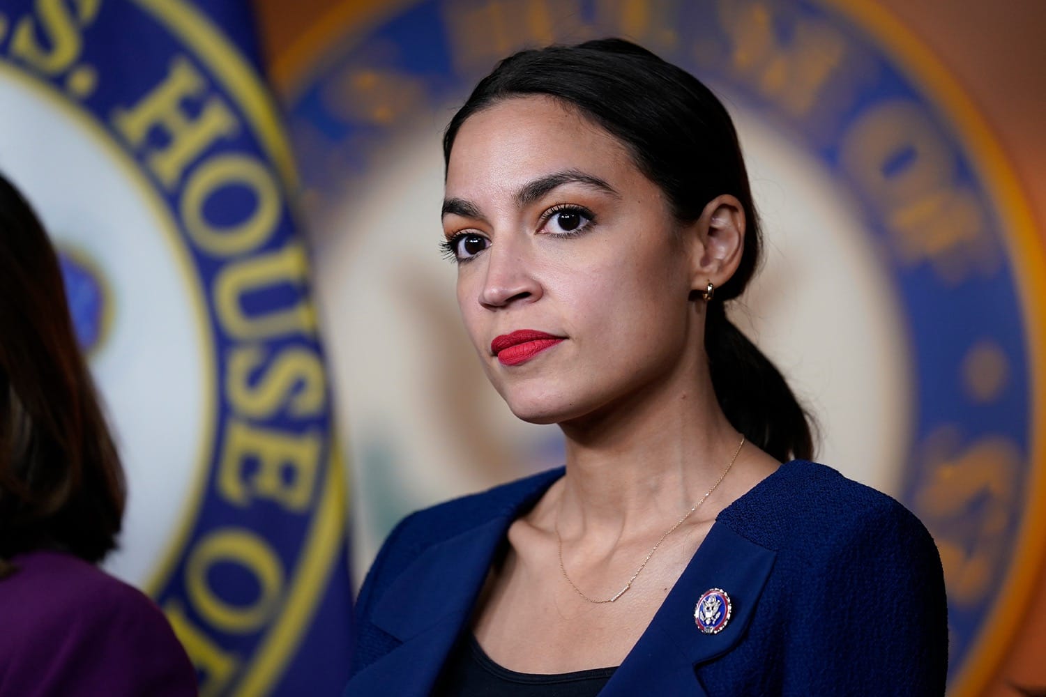 AOC Sparks Debate by Removing Pronouns from X Bio