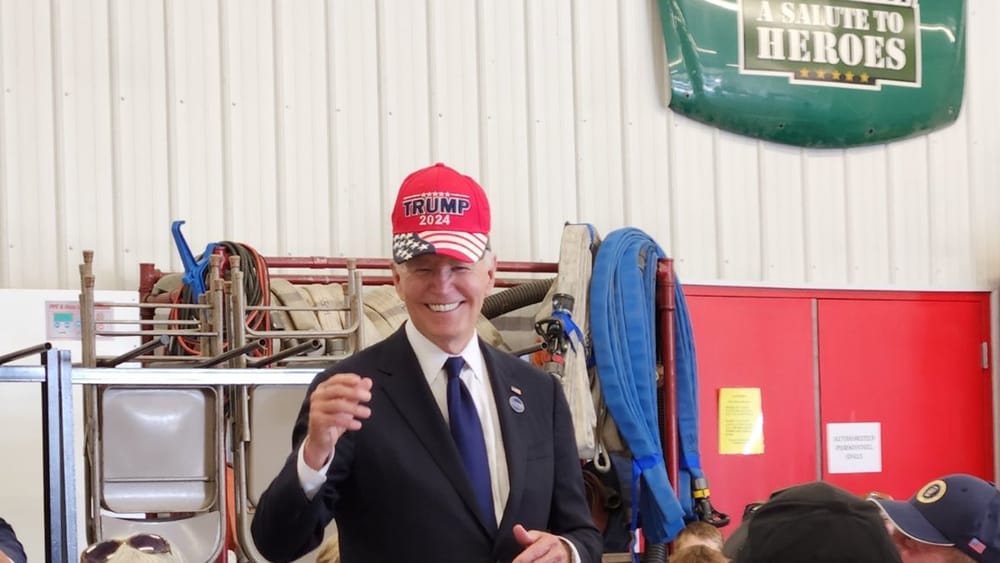 Biden Dons Trump Hat in Bizarre Show of Unity Post-Debate post image